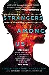 Cover of Strangers Among Us: Tales of the Underdogs and Outcasts